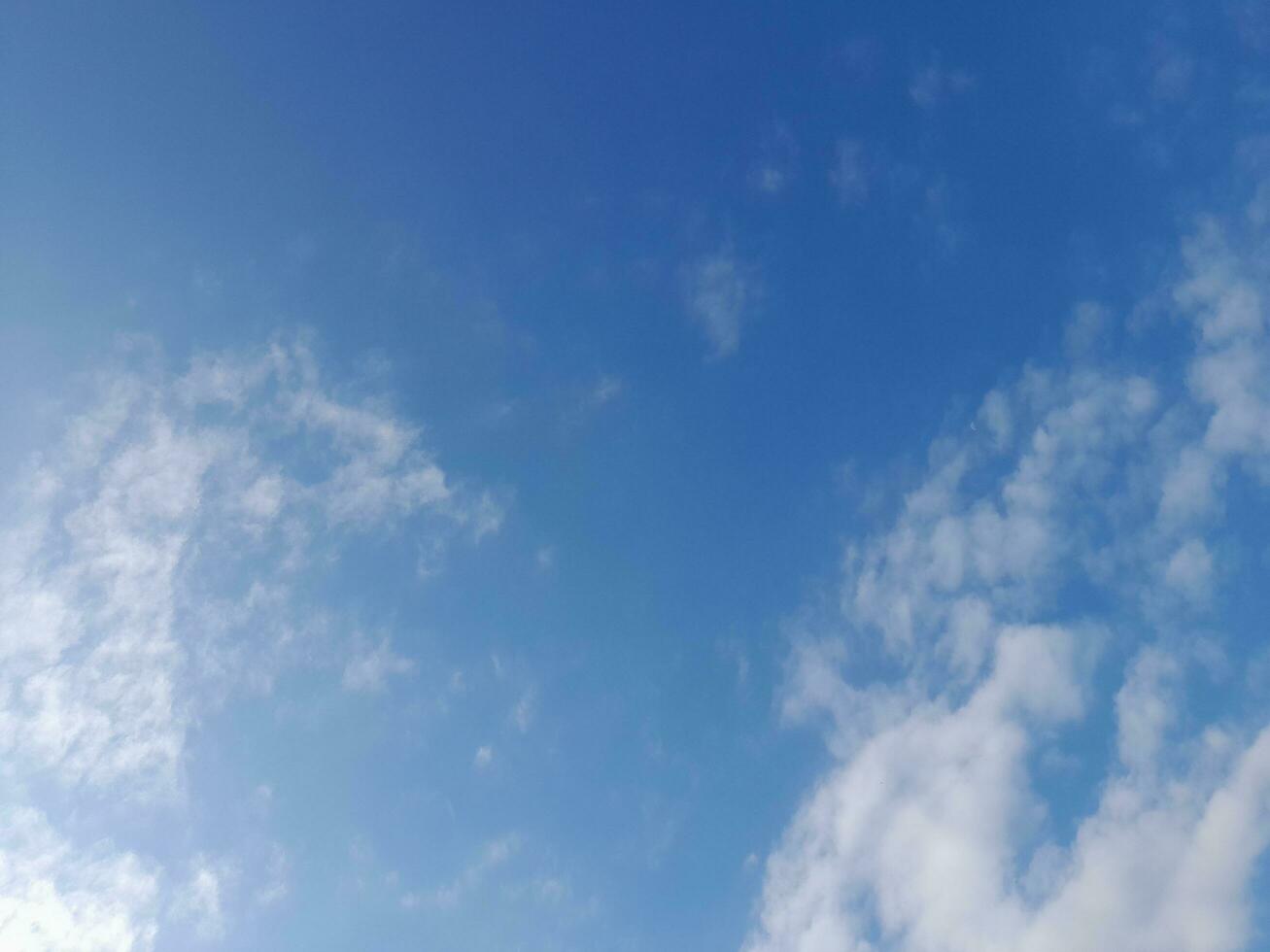 The white clouds on the blue sky are perfect for the background.  Skyscape on Lombok Island, Indonesia photo