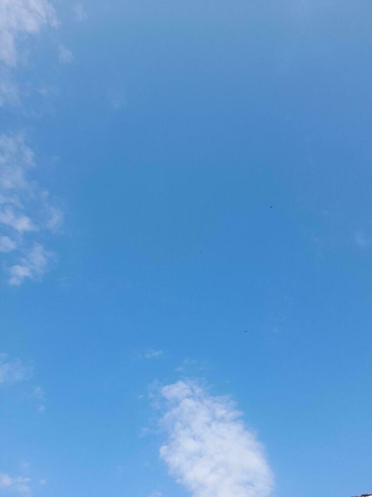 The white clouds on the blue sky are perfect for the background.  Skyscape on Lombok Island, Indonesia photo