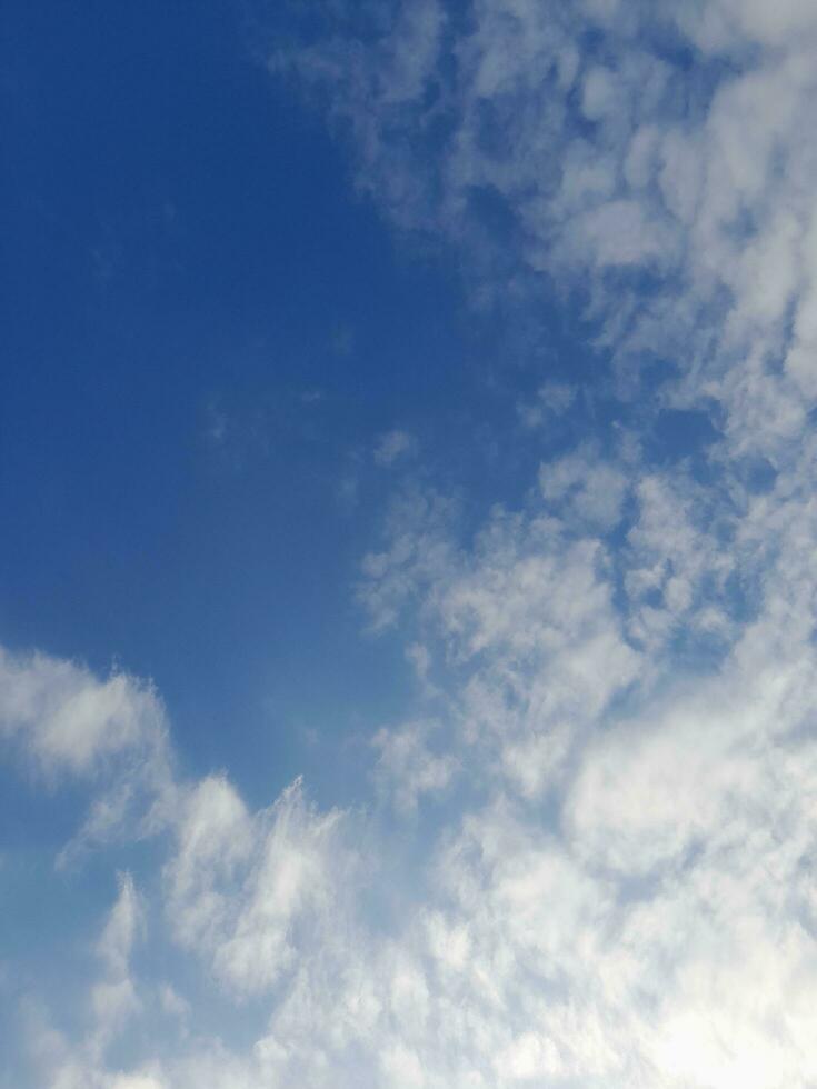 The white clouds on the blue sky are perfect for the background.  Skyscape on Lombok Island, Indonesia photo