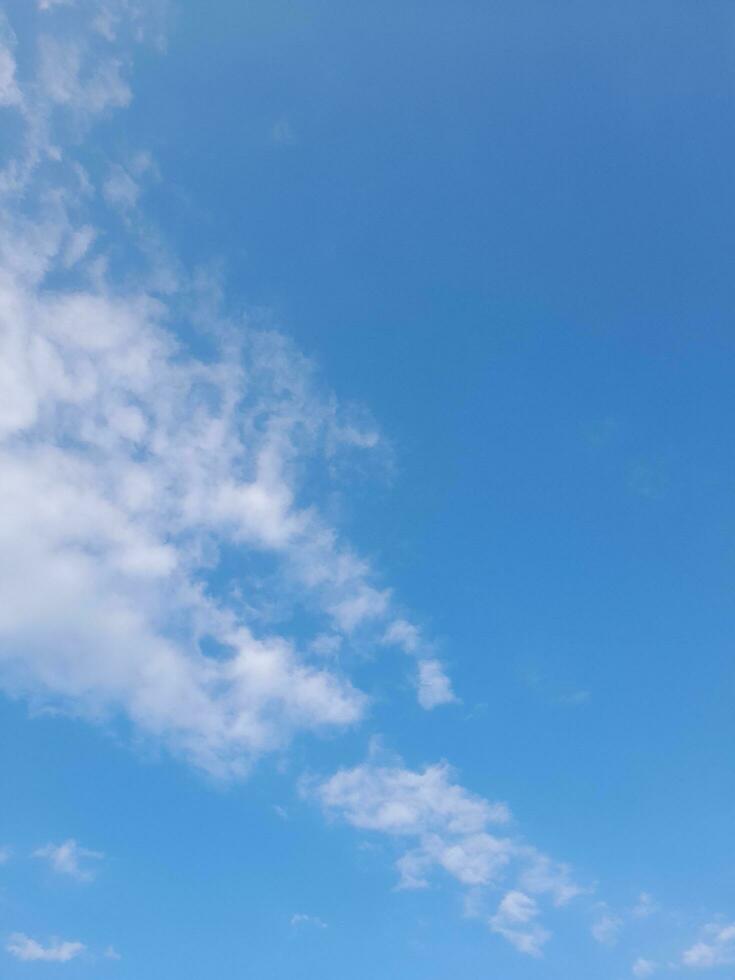 The white clouds on the blue sky are perfect for the background.  Skyscape on Lombok Island, Indonesia photo