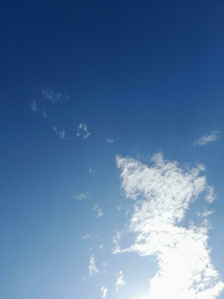 The white clouds on the blue sky are perfect for the background.  Skyscape on Lombok Island, Indonesia photo