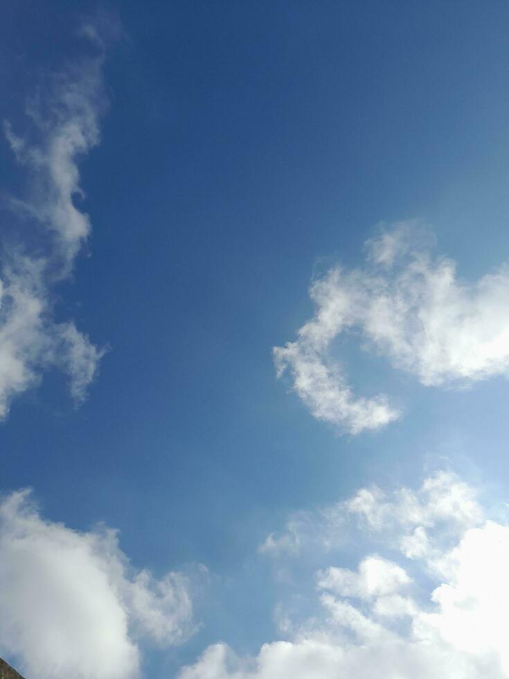 The white clouds on the blue sky are perfect for the background.  Skyscape on Lombok Island, Indonesia photo