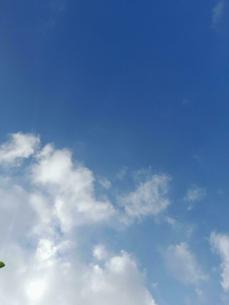 The white clouds on the blue sky are perfect for the background.  Skyscape on Lombok Island, Indonesia photo