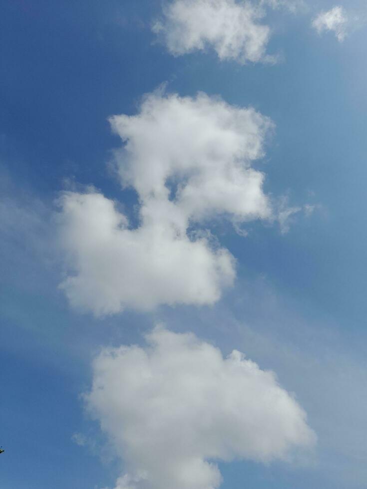 The white clouds on the blue sky are perfect for the background.  Skyscape on Lombok Island, Indonesia photo