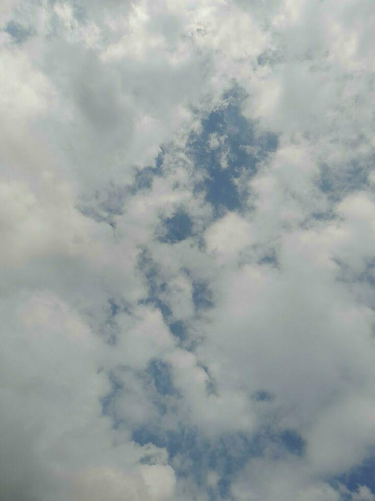 The white clouds on the blue sky are perfect for the background.  Skyscape on Lombok Island, Indonesia photo