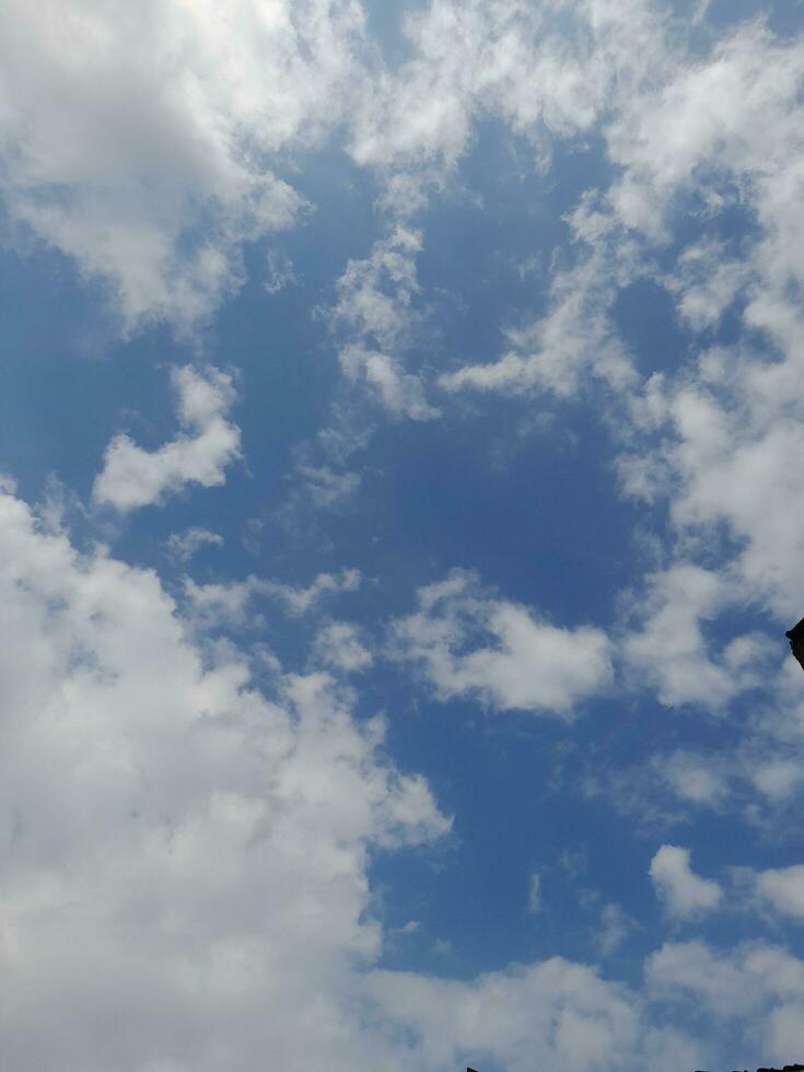 The white clouds on the blue sky are perfect for the background.  Skyscape on Lombok Island, Indonesia photo