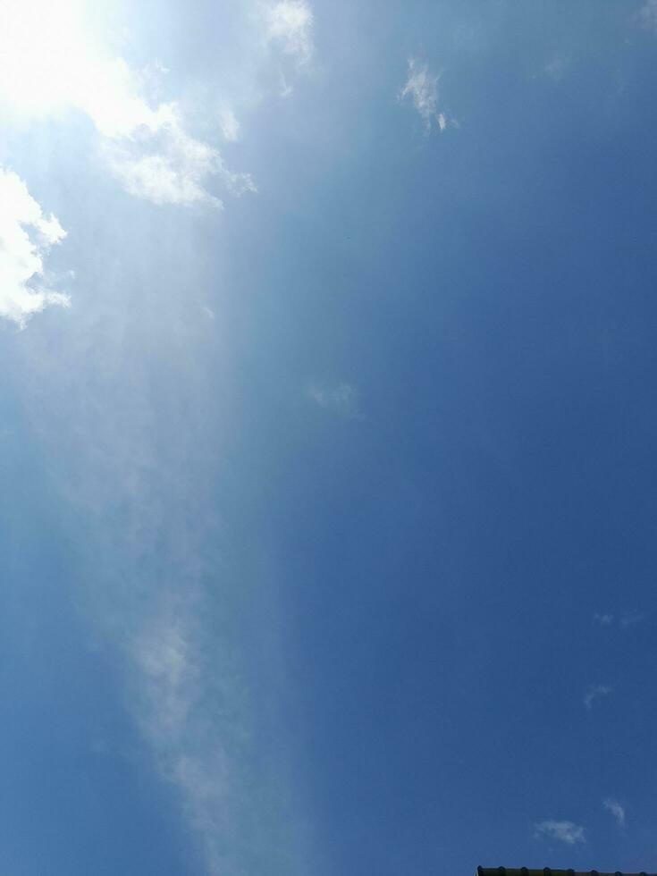 The white clouds on the blue sky are perfect for the background.  Skyscape on Lombok Island, Indonesia photo