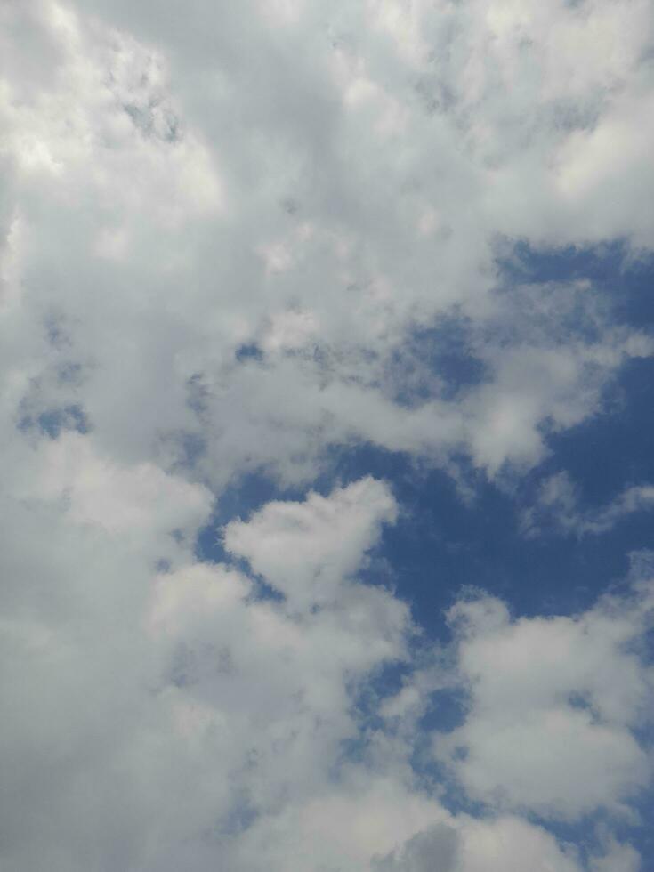 The white clouds on the blue sky are perfect for the background.  Skyscape on Lombok Island, Indonesia photo