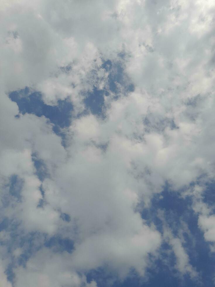 The white clouds on the blue sky are perfect for the background.  Skyscape on Lombok Island, Indonesia photo