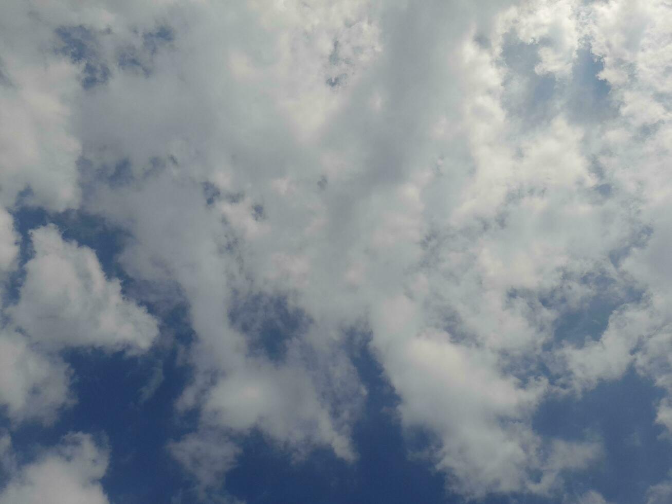 The white clouds on the blue sky are perfect for the background.  Skyscape on Lombok Island, Indonesia photo