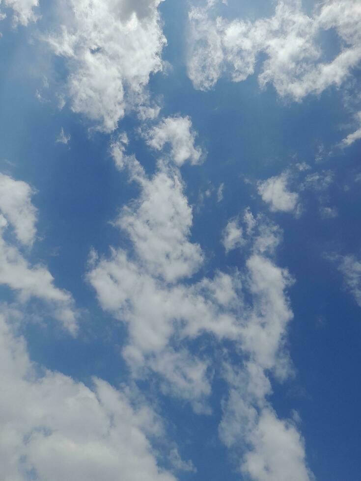 The white clouds on the blue sky are perfect for the background.  Skyscape on Lombok Island, Indonesia photo