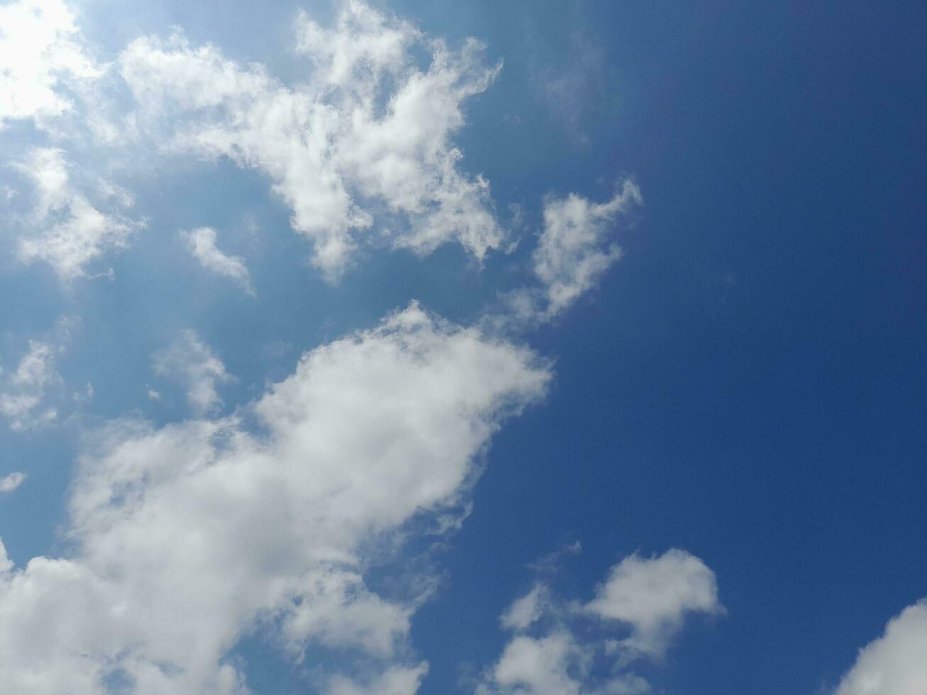 The white clouds on the blue sky are perfect for the background.  Skyscape on Lombok Island, Indonesia photo