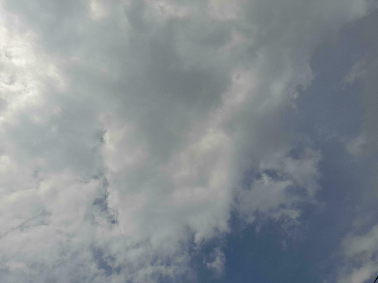 The white clouds on the blue sky are perfect for the background.  Skyscape on Lombok Island, Indonesia photo