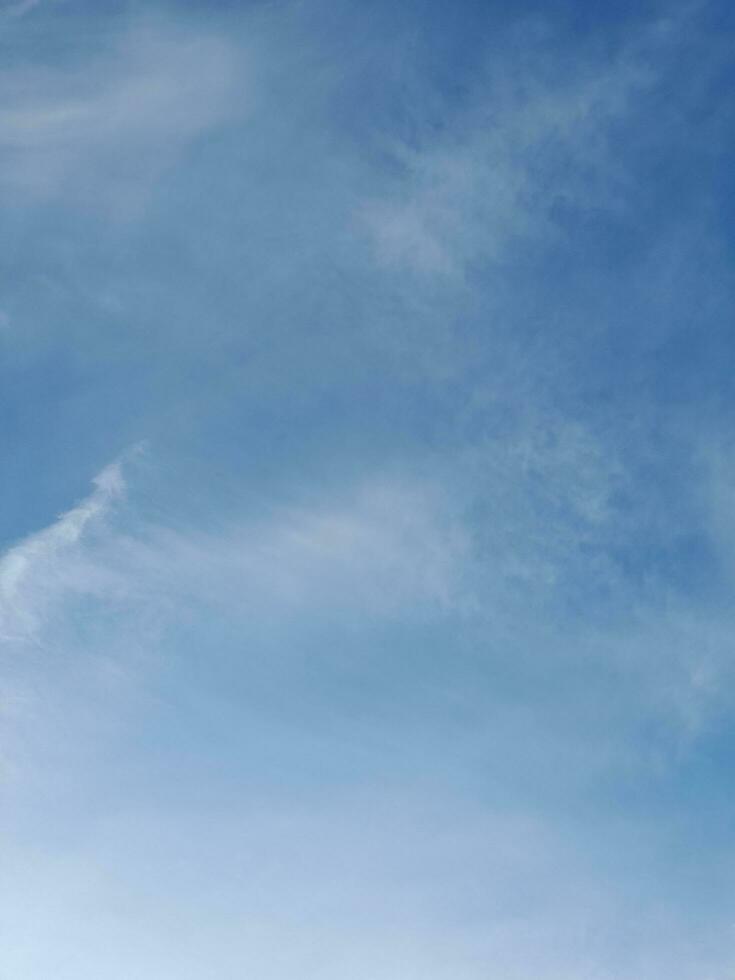 The white clouds on the blue sky are perfect for the background.  Skyscape on Lombok Island, Indonesia photo