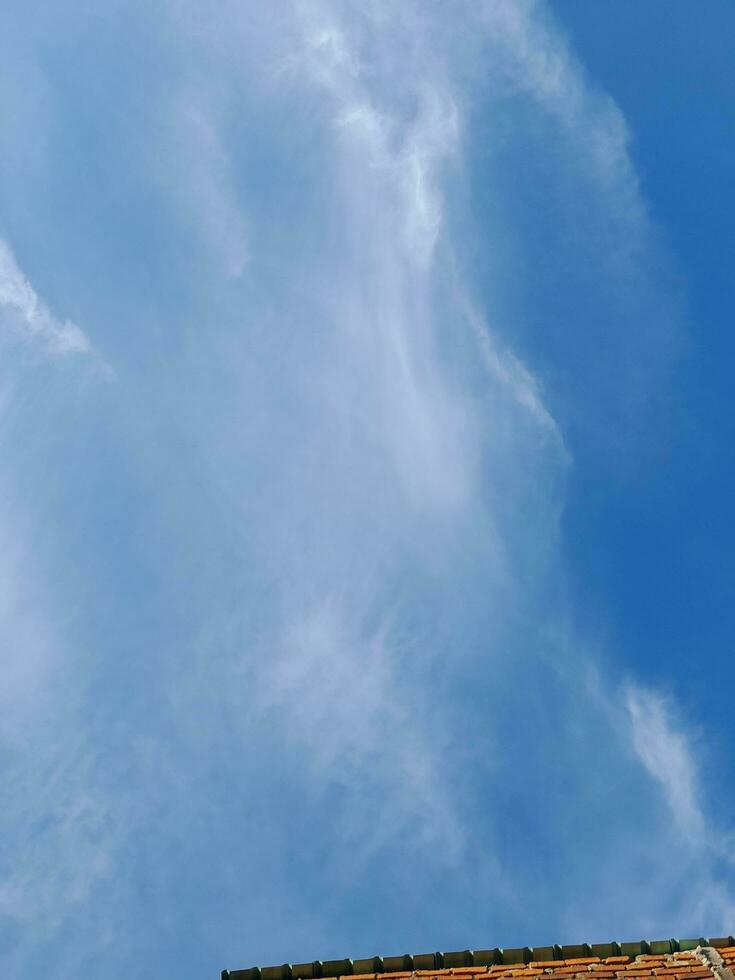 The white clouds on the blue sky are perfect for the background.  Skyscape on Lombok Island, Indonesia photo