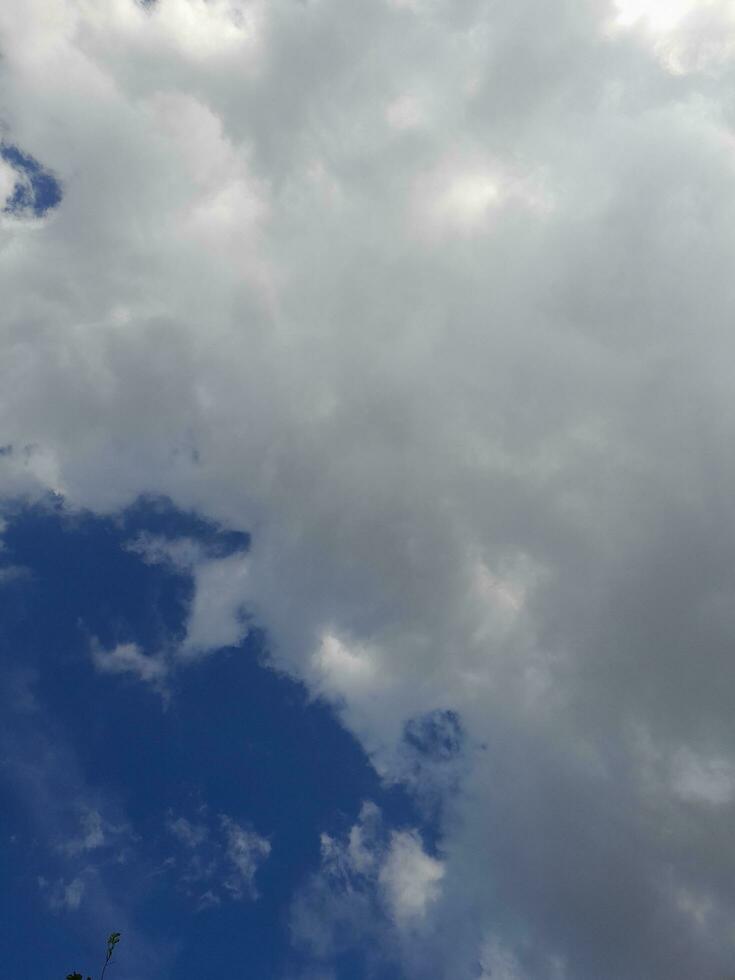 The white clouds on the blue sky are perfect for the background.  Skyscape on Lombok Island, Indonesia photo