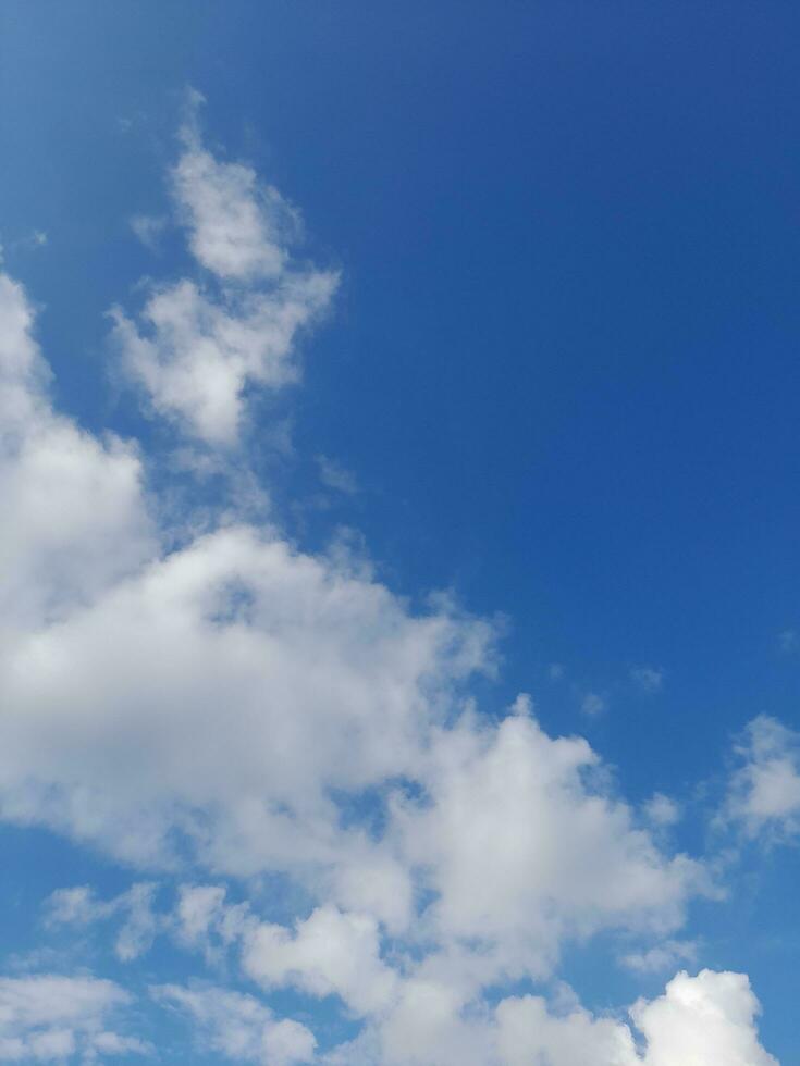 The white clouds on the blue sky are perfect for the background.  Skyscape on Lombok Island, Indonesia photo