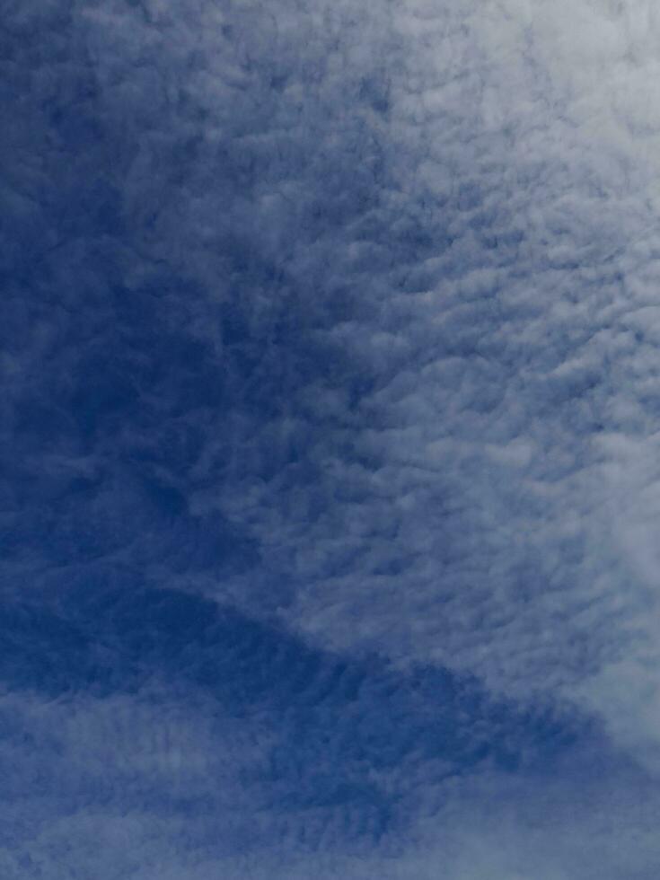 The white clouds on the blue sky are perfect for the background.  Skyscape on Lombok Island, Indonesia photo