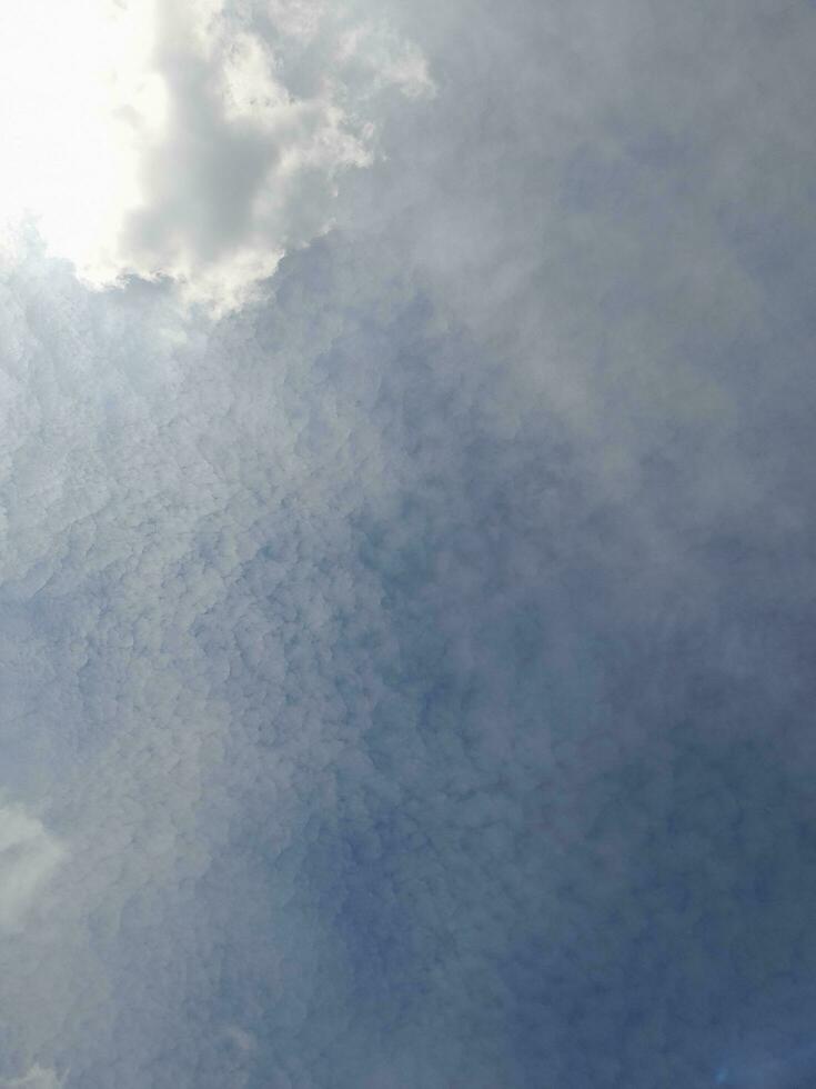 The white clouds on the blue sky are perfect for the background.  Skyscape on Lombok Island, Indonesia photo