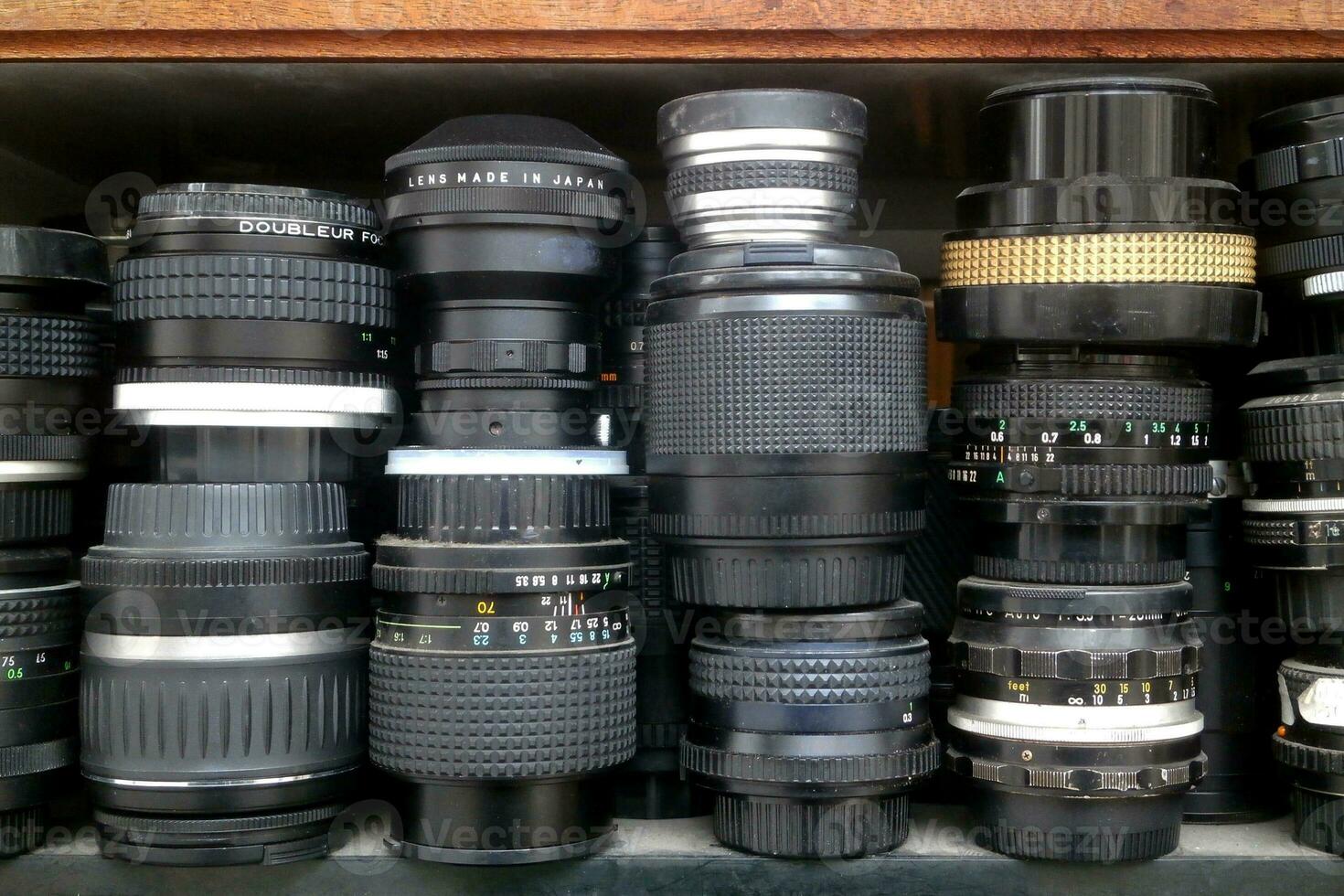 Stack of camera lenses and doubleurs photo