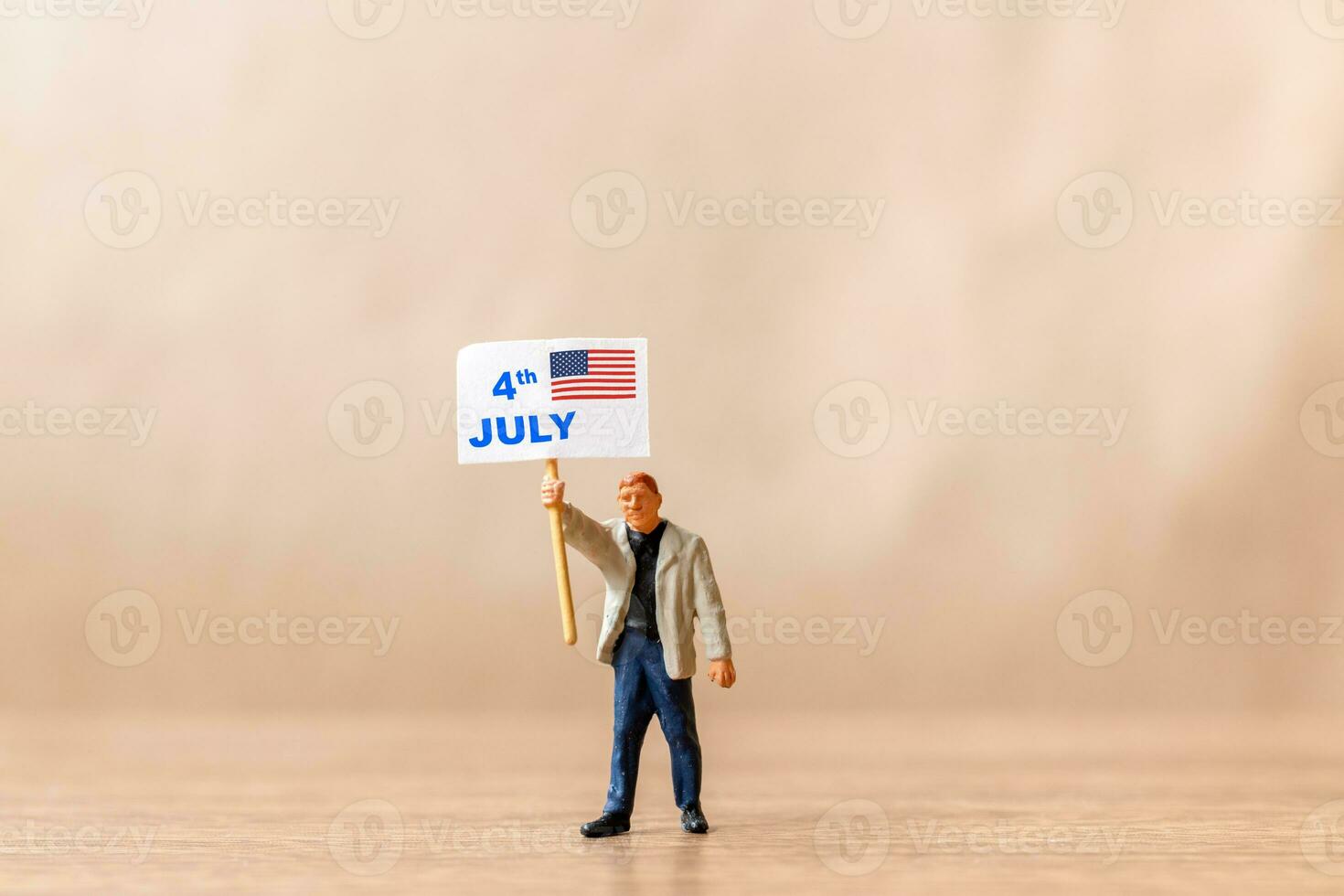 Americans raising flags in celebration of the Fourth of July and Independence Day photo