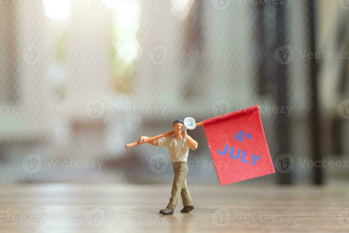 Americans raising flags in celebration of the Fourth of July and Independence Day photo