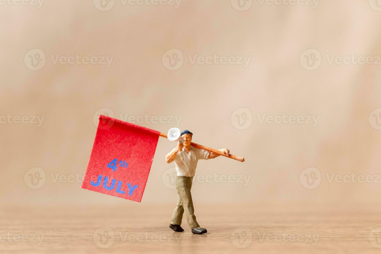 Americans raising flags in celebration of the Fourth of July and Independence Day photo