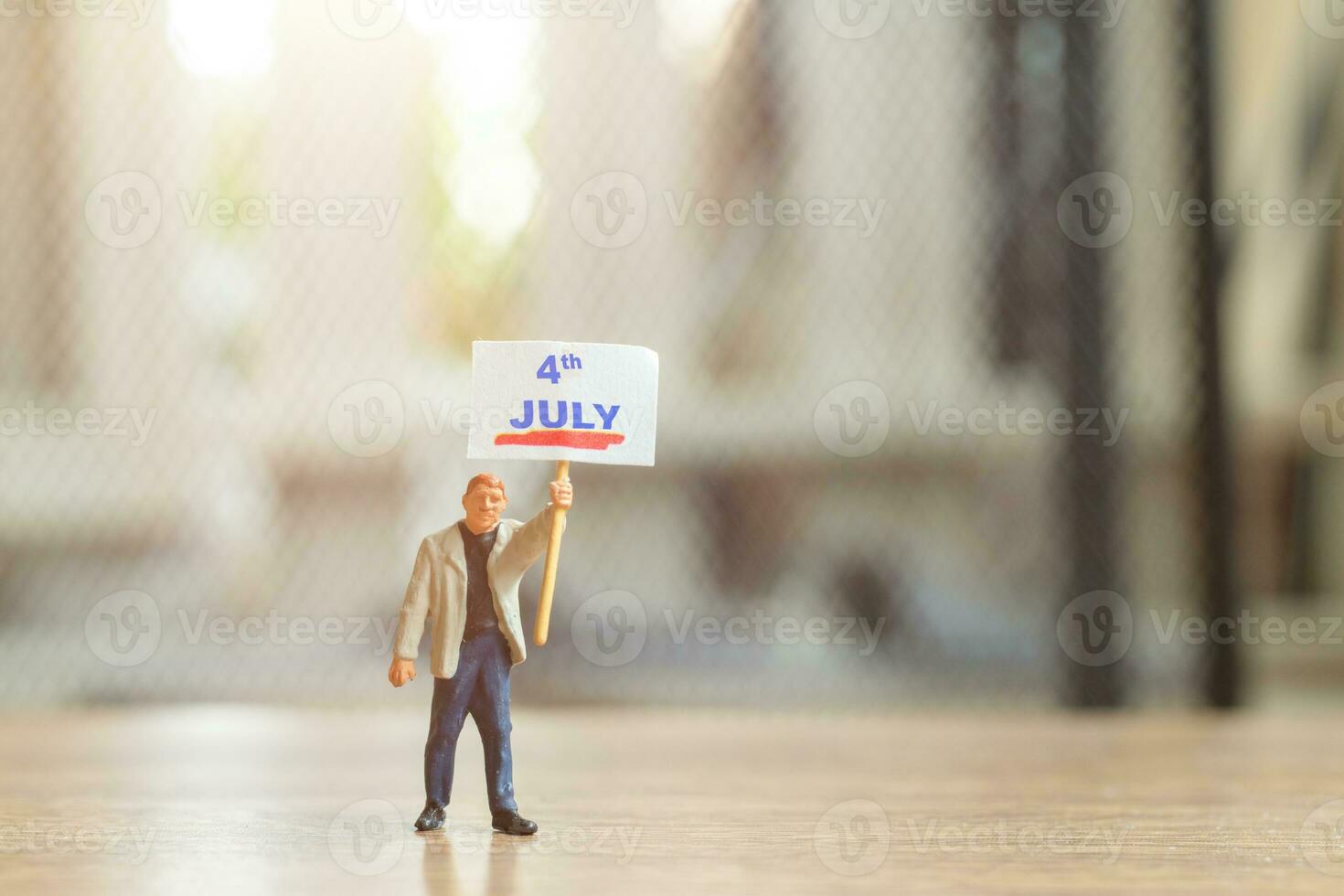 Americans raising flags in celebration of the Fourth of July and Independence Day photo