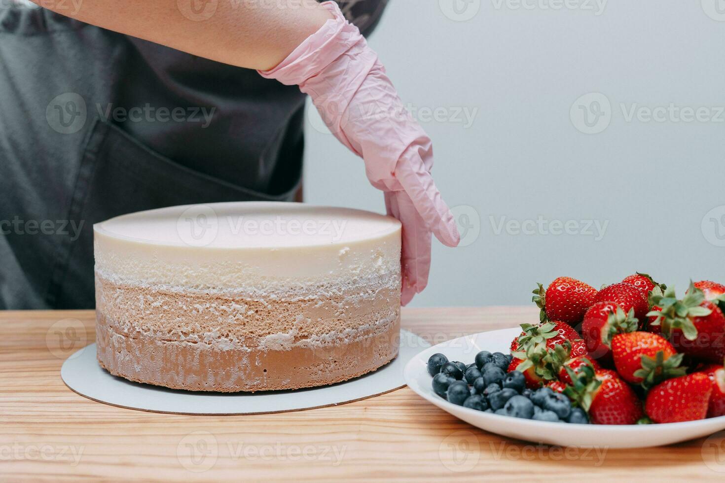 Cooking mousse cake at a cooking class. Cooking at home, home-made food. Confectioner. photo