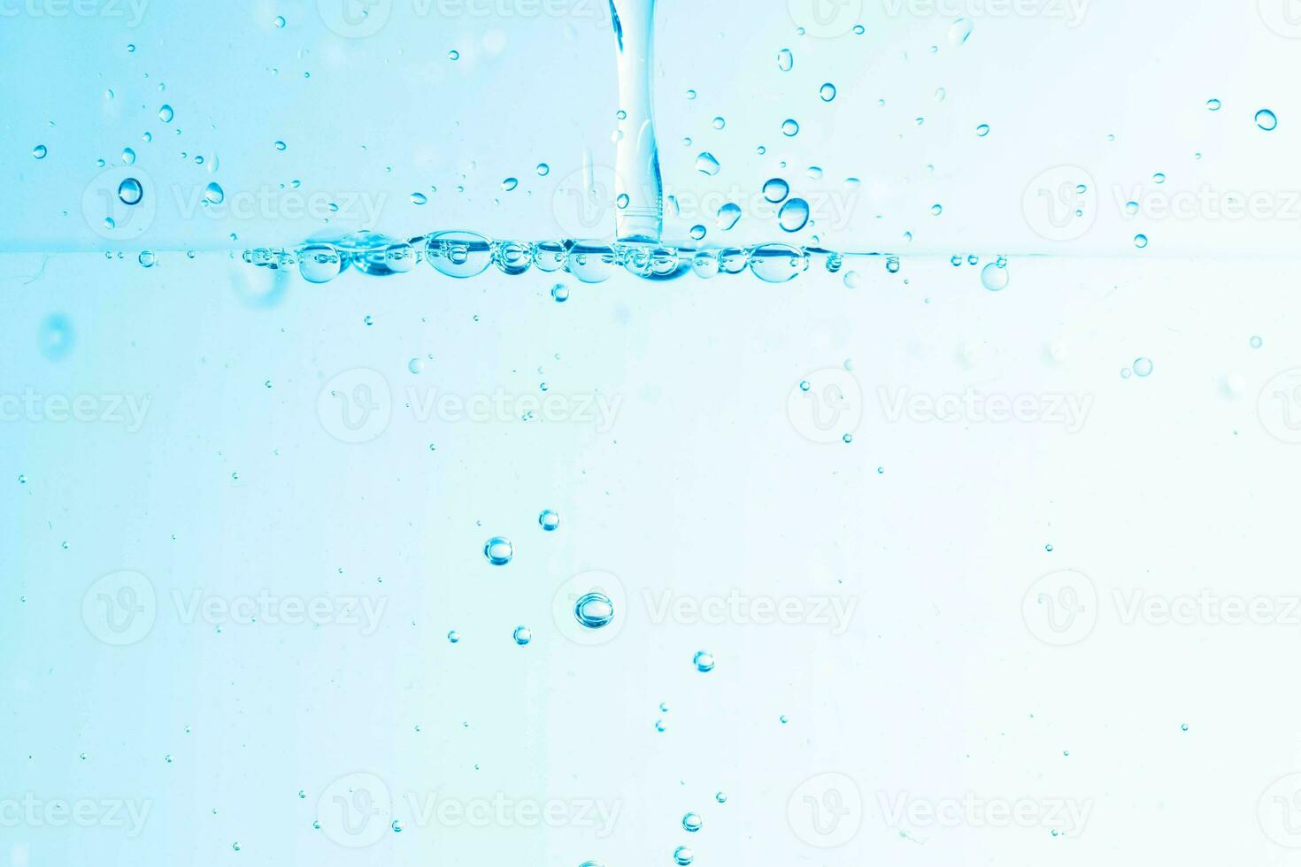 Background image of moving water in waves isolated on white background, clear water, water bubbles,macro photo