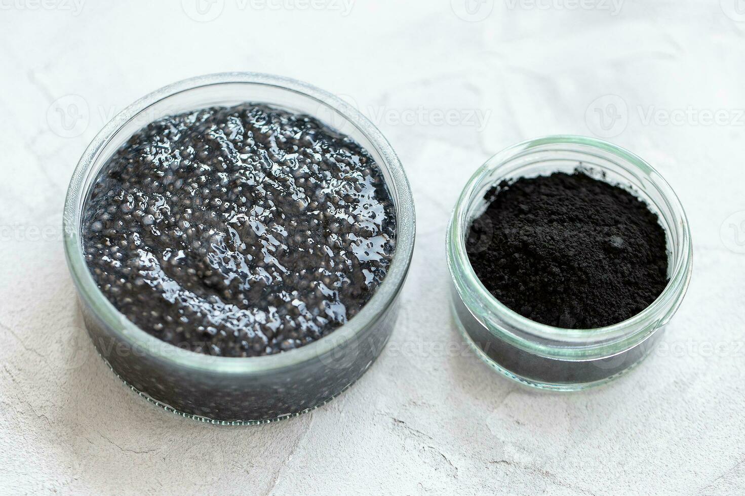 Black chia pudding with activated charcoal powder photo