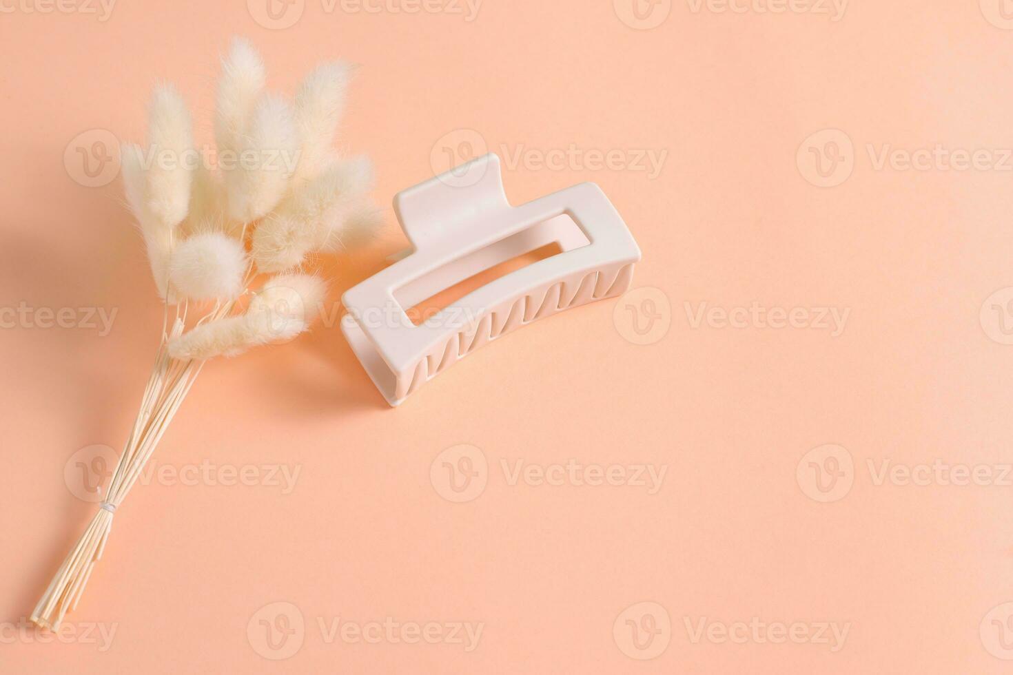 Hair clip, beige stylish claw, copy space photo