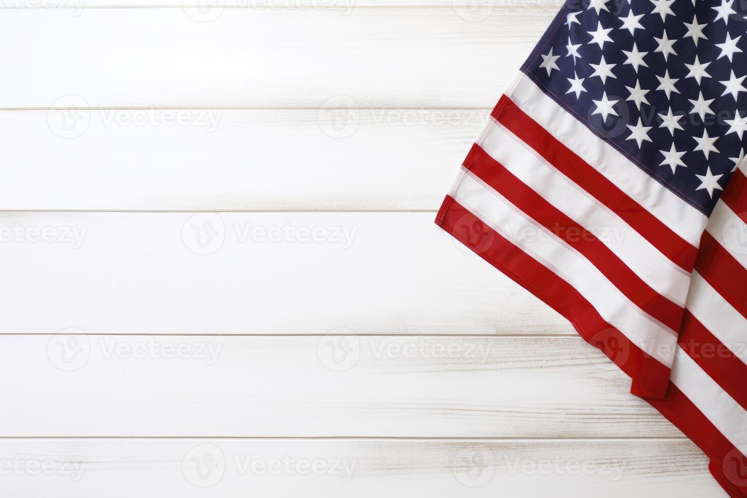 4th July concept. USA flag on white wooden background with copy space text area. . photo