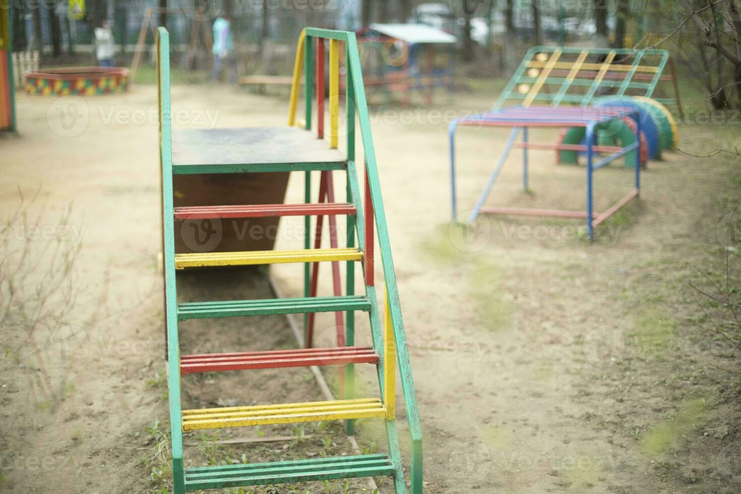 Slide on playground. Children's play area. Play area in yard. photo