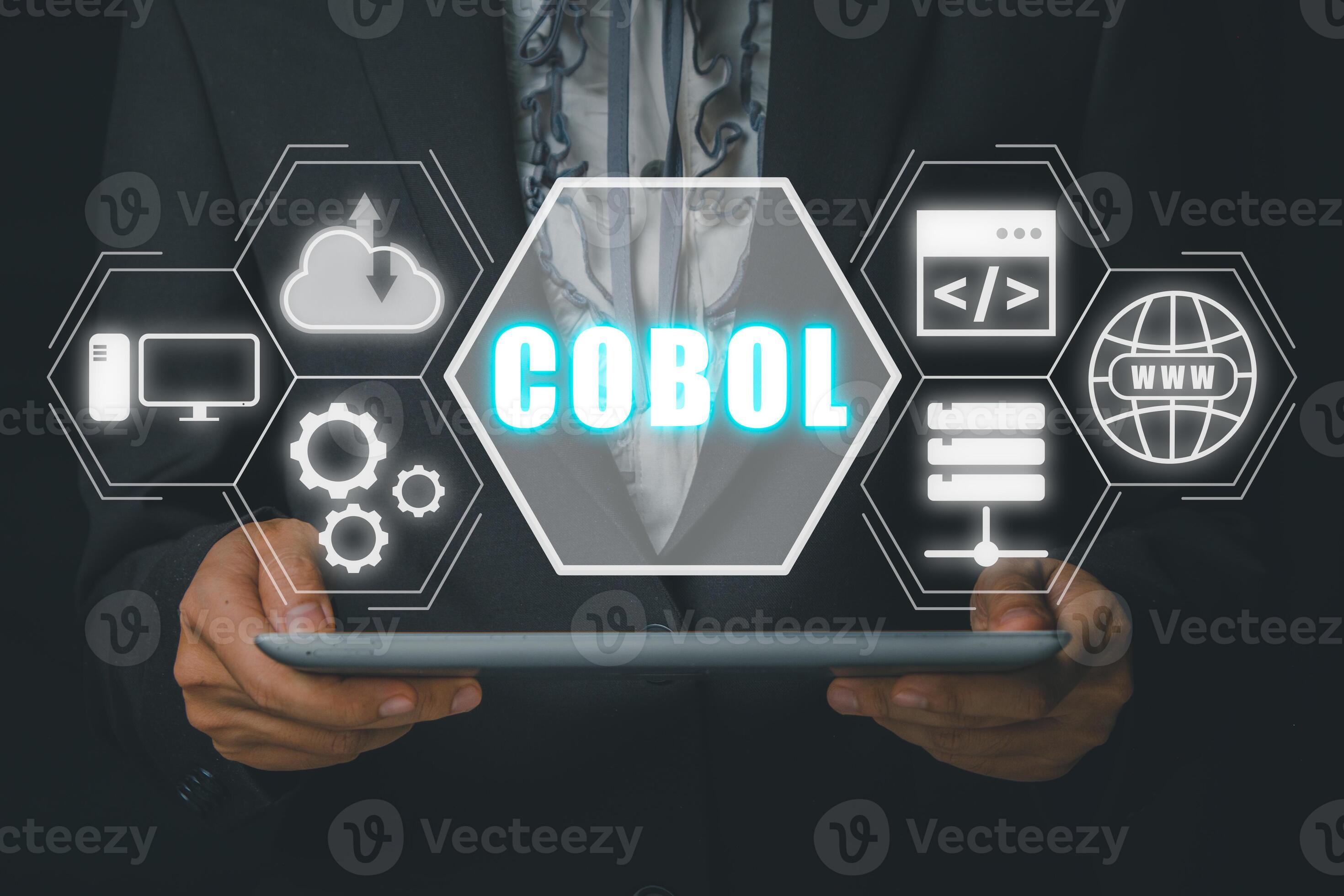 Cobol common business oriented language person hand holding tablet