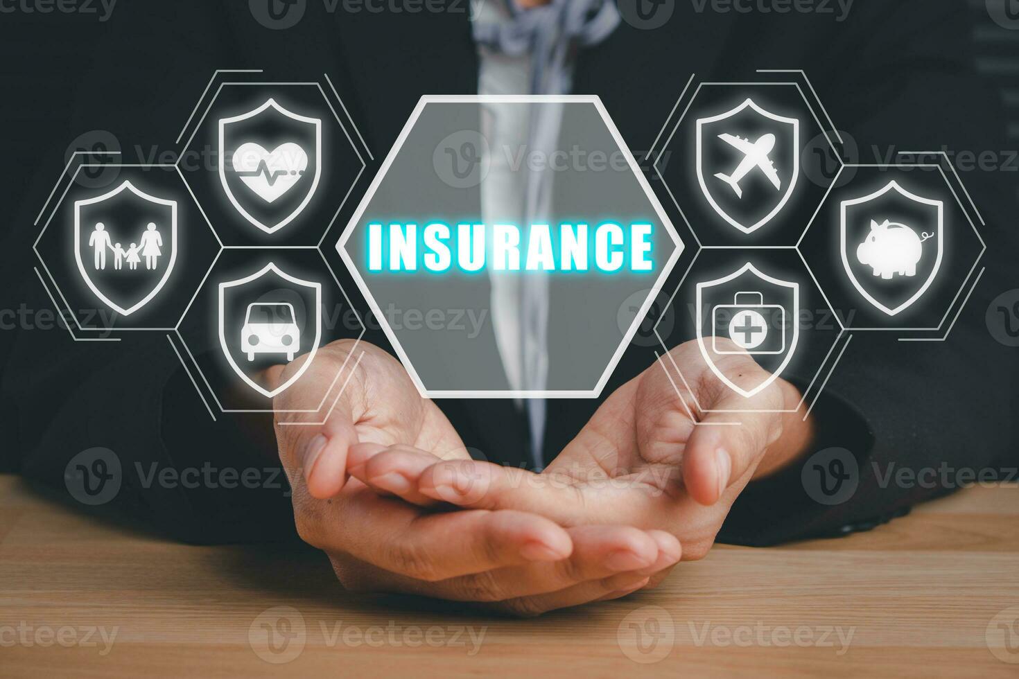 Insurance company client take out complete insurance concept, Person hand holding with  Insurance icon on virtual screen background on desk. photo