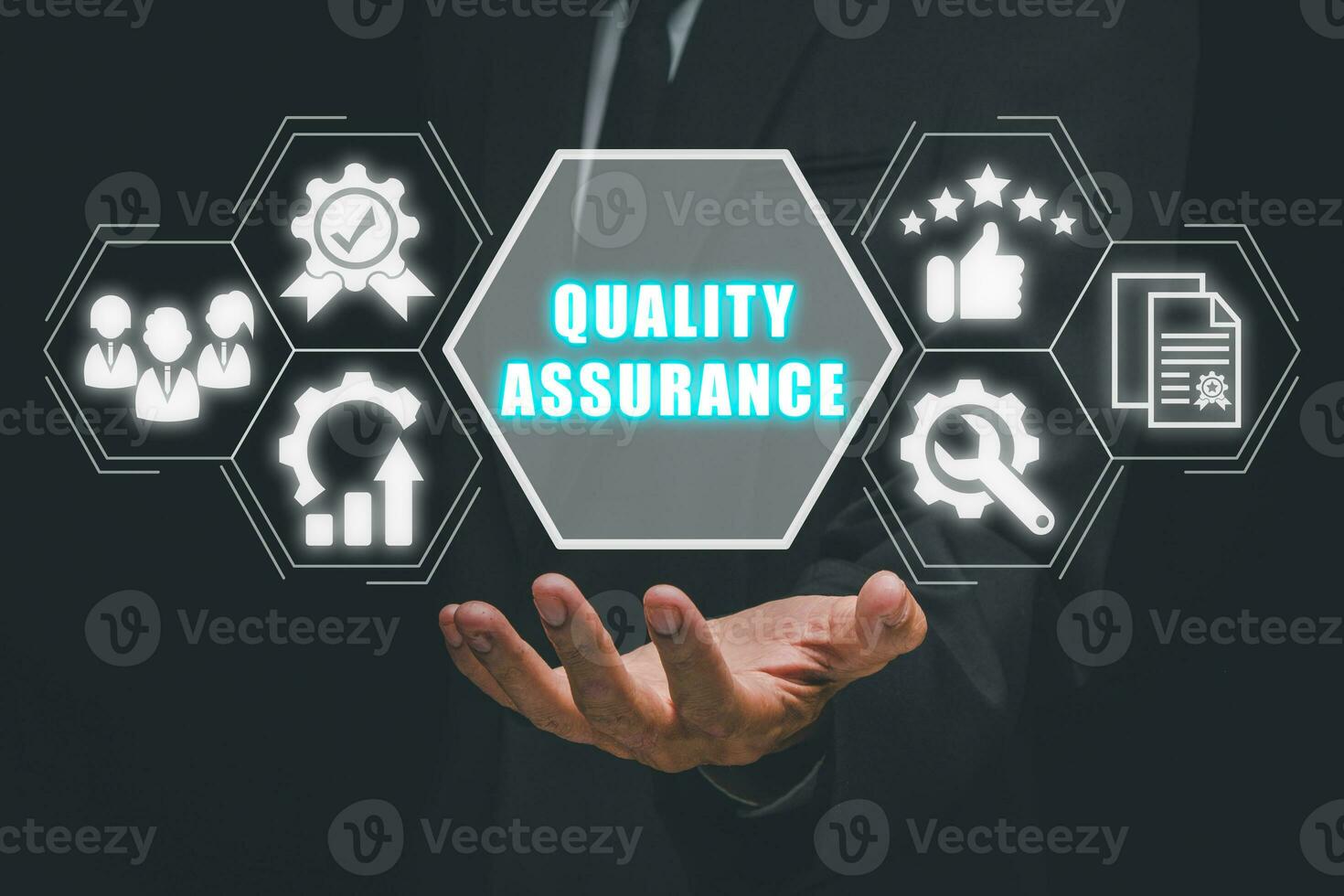 Quality Assurance concept, Business hand holding Quality Assurance icon on virtual screen. photo