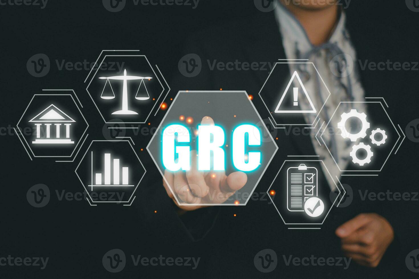 GRC, Governance Risk and Compliance concept, Business hand touching Governance Risk and Compliance icon on virtual screen. photo