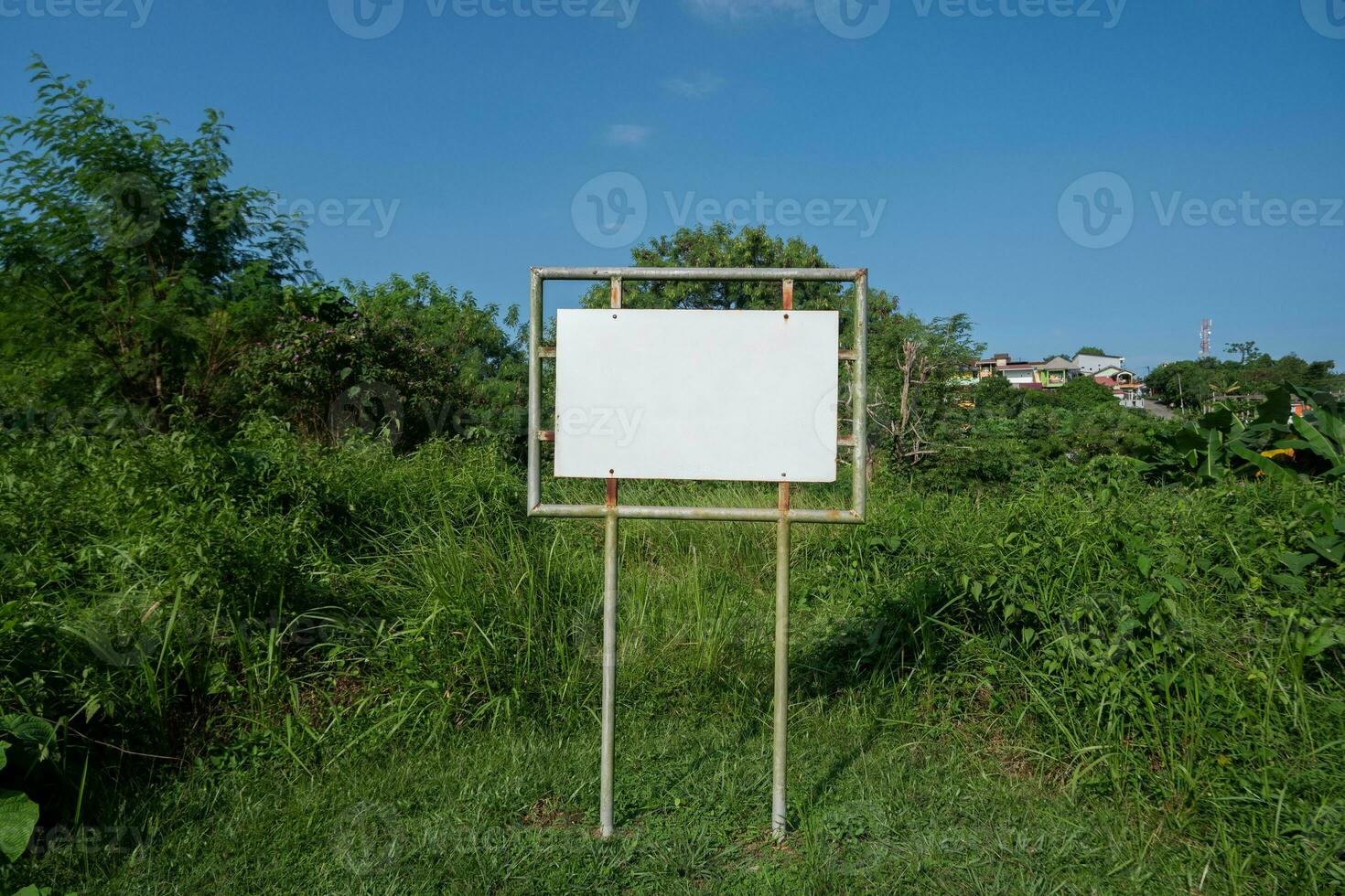 selevtive focus on Realistic white traffic sign on two metal poles. Rectangular blank traffic road empty sign. Mock up template for your design. photo