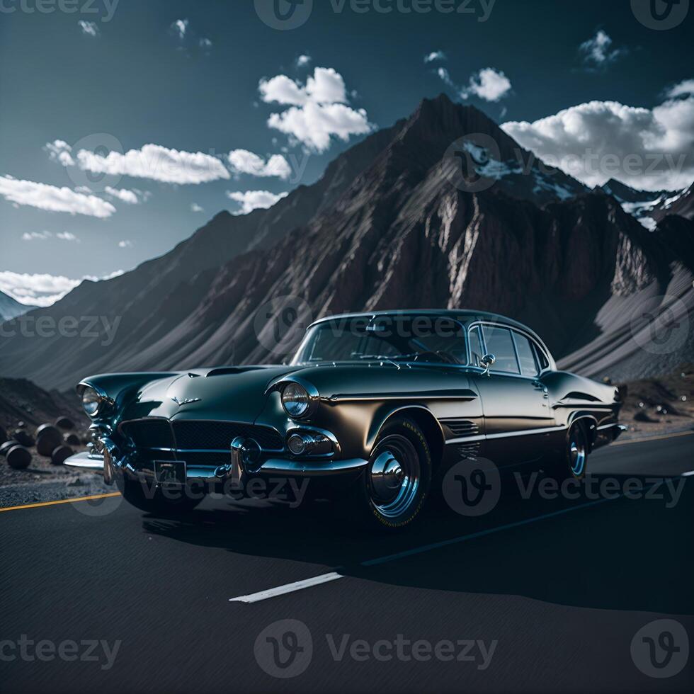 a Classic Car withy mountains in the background photo