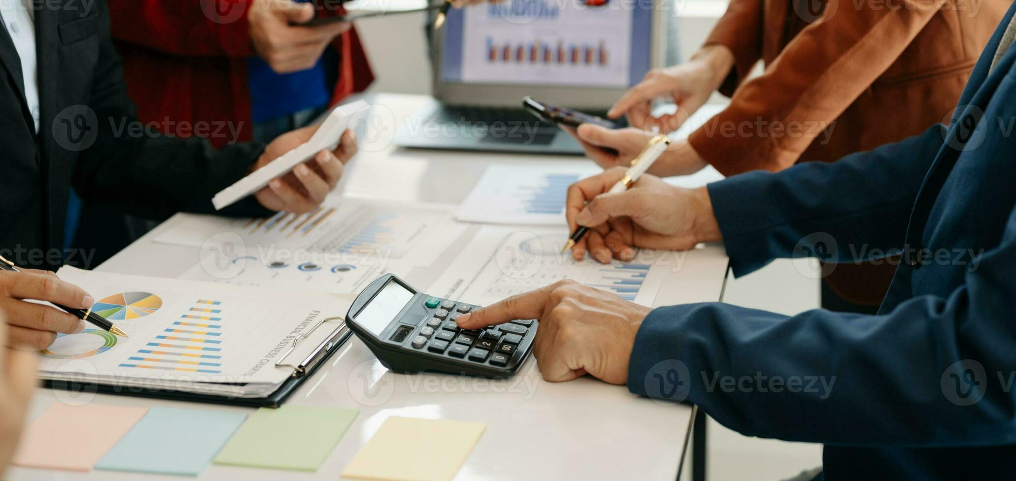 Business team meeting present.professional investor working with  Finance managers task. with laptop smart phone and digital tablet in morning light photo