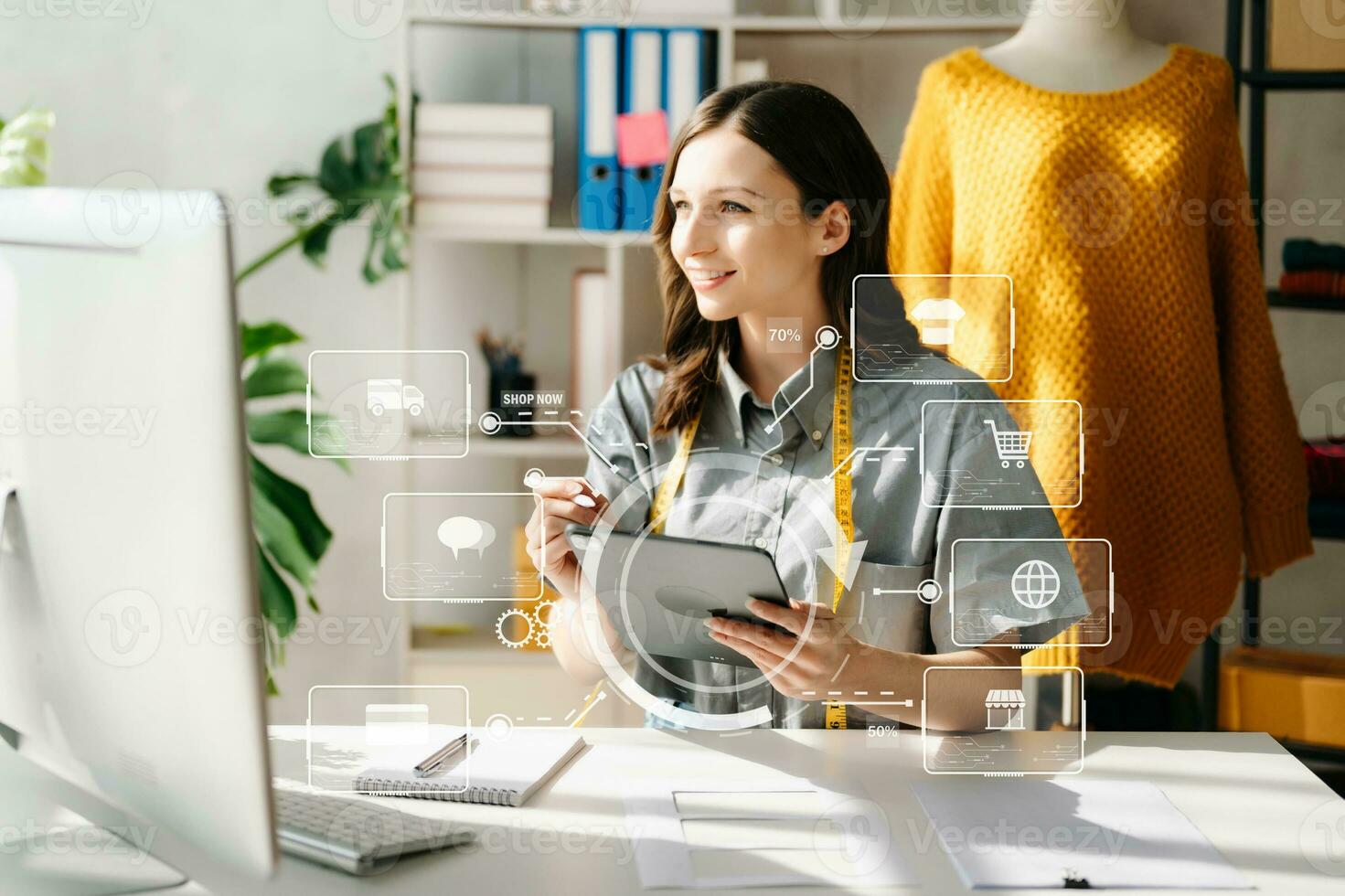 Woman hand using a laptop, smartphone and tablet and writing notebook at the office photo