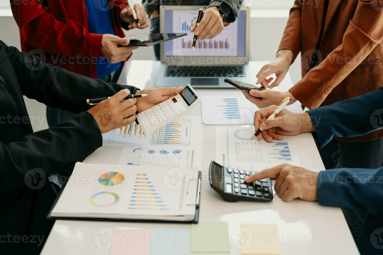 Business team meeting present.professional investor working with  Finance managers task. with laptop smart phone and digital tablet in morning light photo