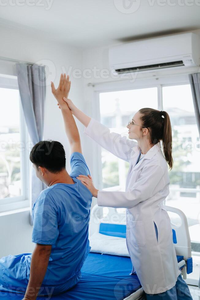 Doctor consulting with patient Back problems Physical therapy concept photo