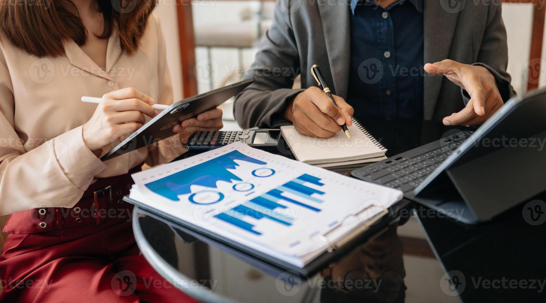 Business team meeting. professional investor working new start up project. Finance task. with smart phone and laptop and digital tablet computer photo