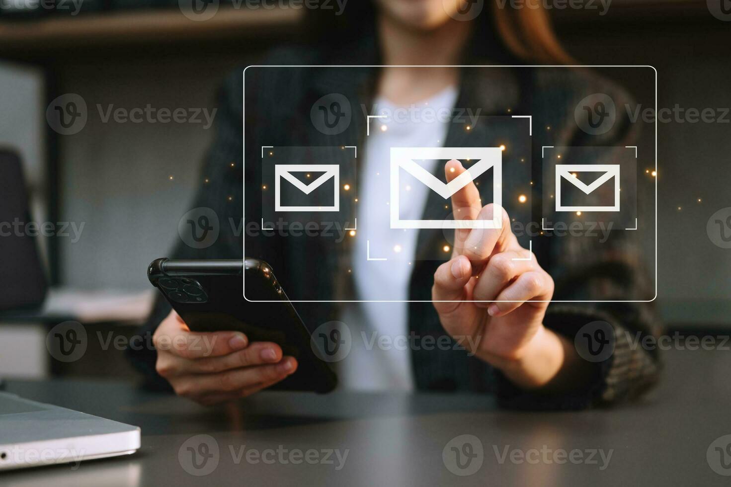 Woman hands using Laptop, tablet typing on keyboard and surfing the internet with email icon, email marketing concept, send e-mail or newsletter, online working internet network technology. photo