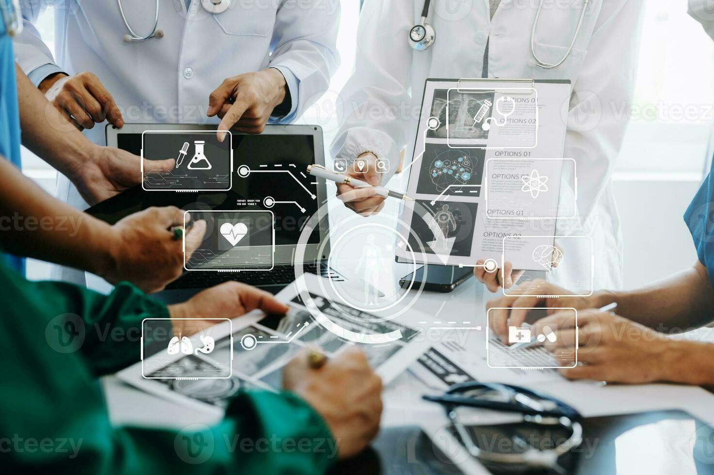 Medical technology network team meeting concept. Doctor hand working with smart phone modern digital tablet and laptop computer with graphics chart interface, with virtual icon photo