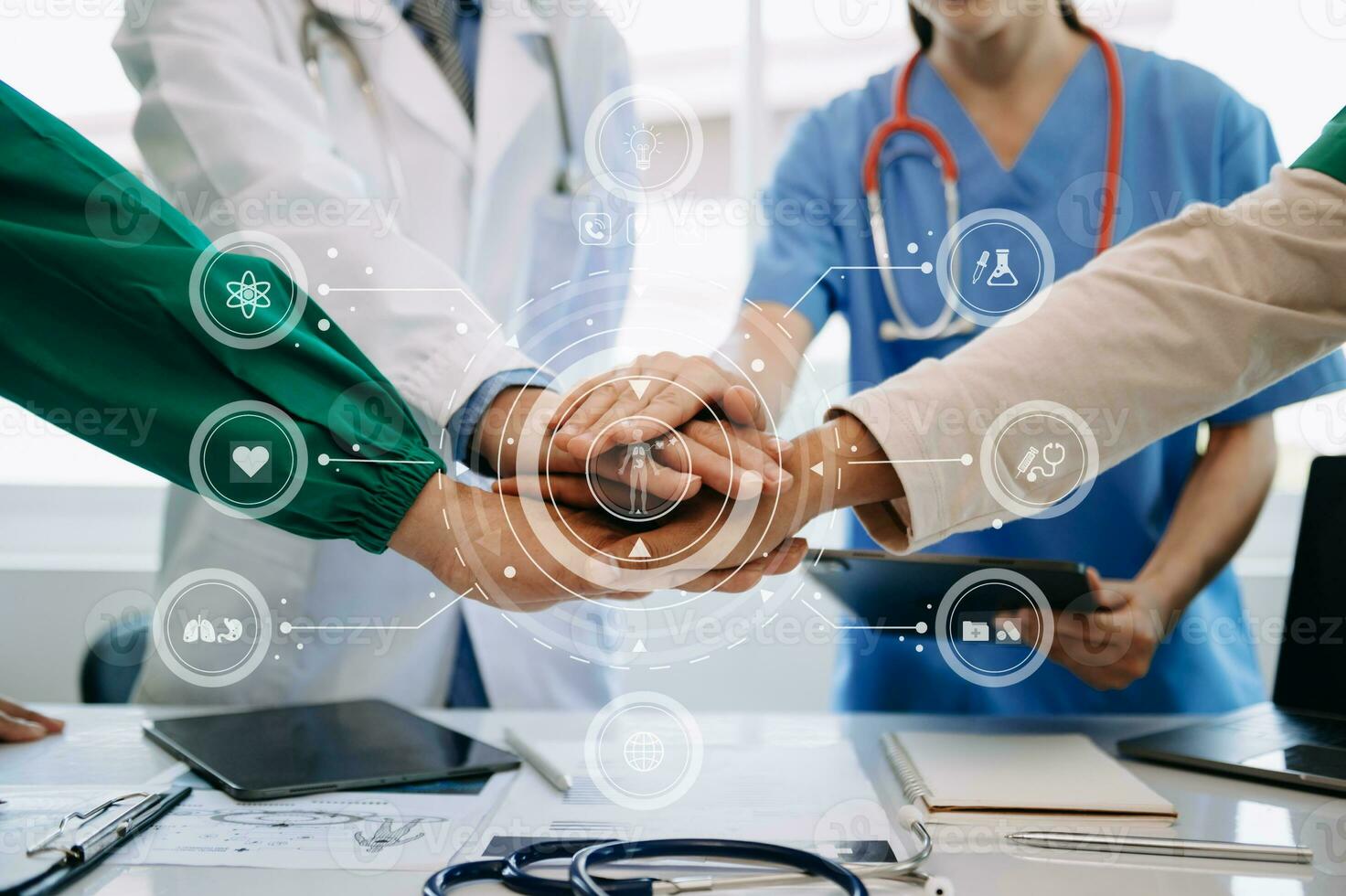 Medical technology network team meeting concept. Doctor hand working with smart phone modern digital tablet and laptop computer with graphics chart interface, with virtual icon photo