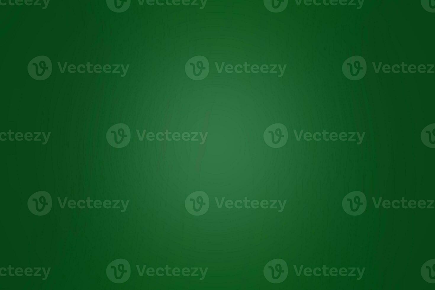 Green abstract background with some smooth light inside photo