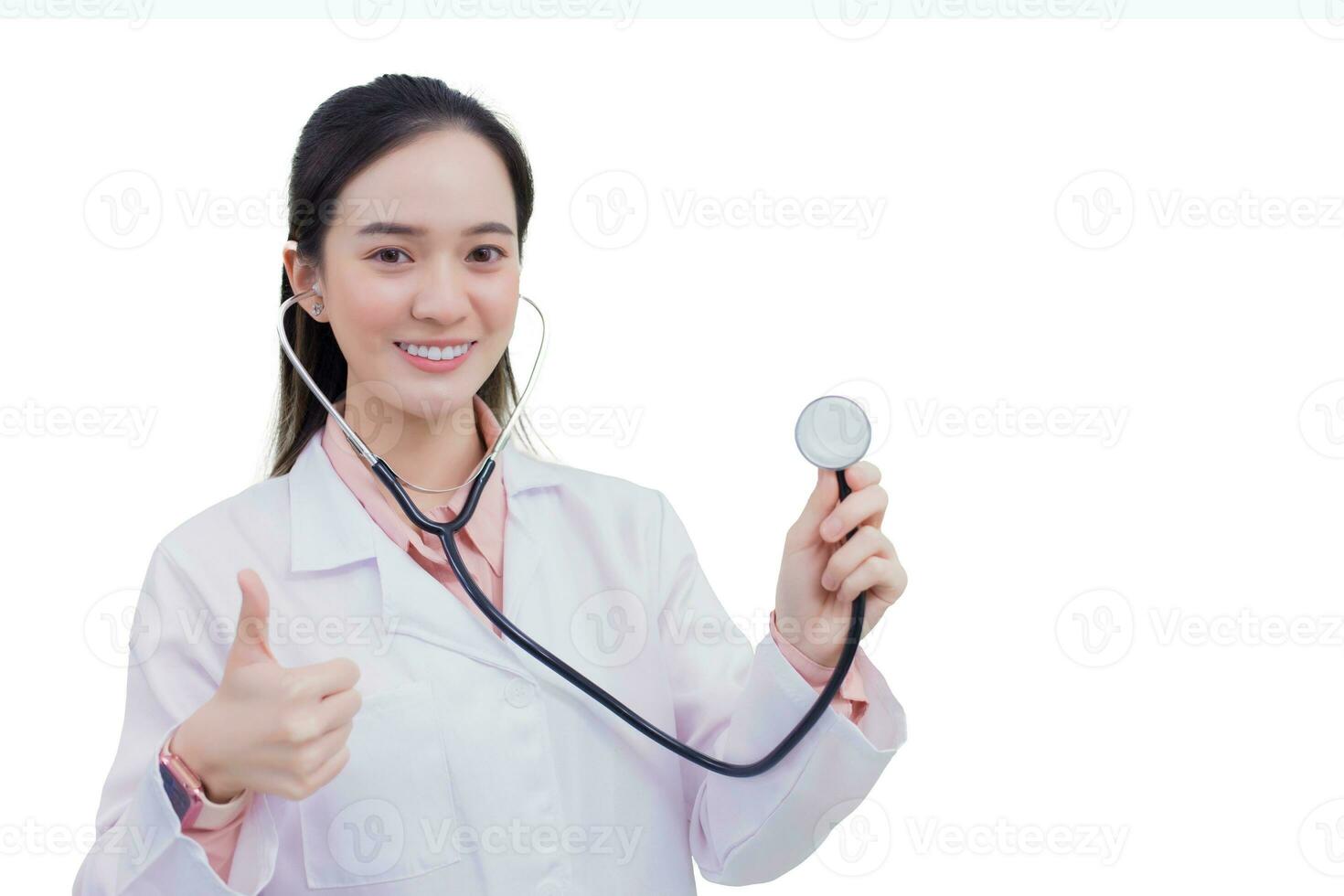 Profession Asian young woman doctor who wears medical uniform is showing hand as thump up isolated on white background.. photo